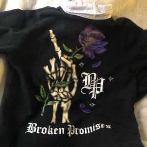 broken promises crew neck sweater